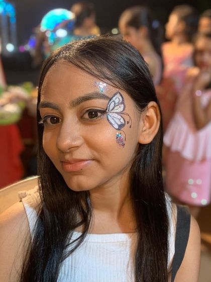 Whimsical Face & Body Art photo 19