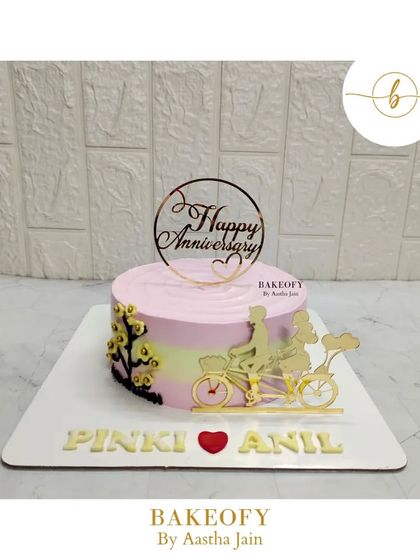 Love is in the air with this sweet anniversary cake. This chocolate mousse cake features a romantic bicycle topper and was inspired by another artist I admire.