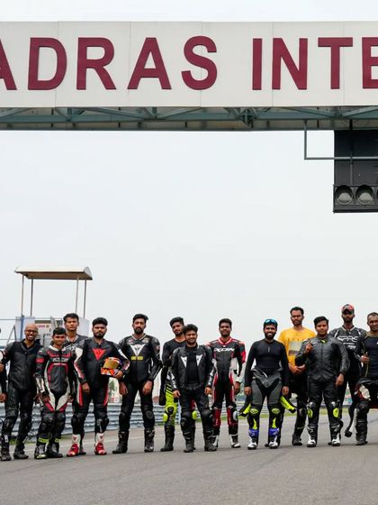 The full lineup of riders from our Season 12, Edition 3 event at MMRT, standing proud under the track gantry.