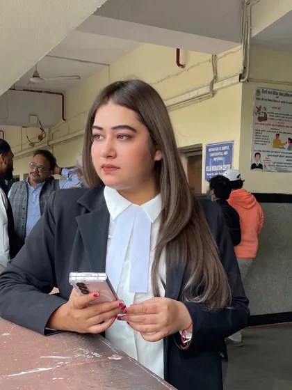 In the court premises, thinking about the next move. My strategy is to create a situation where failure is not an option.
