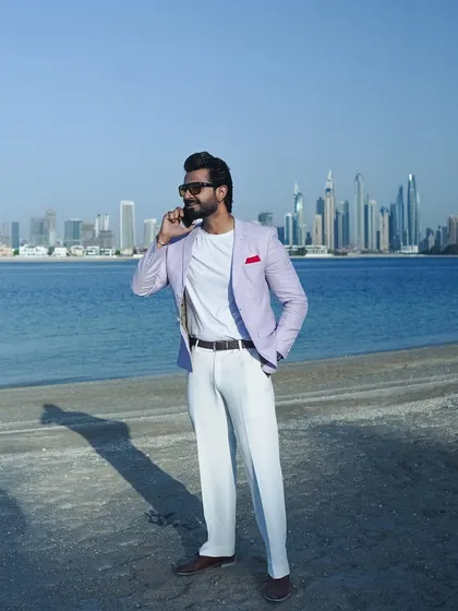 Taking a business call with the Dubai skyline as my office. My work is my passion, and it takes me to the most amazing places.