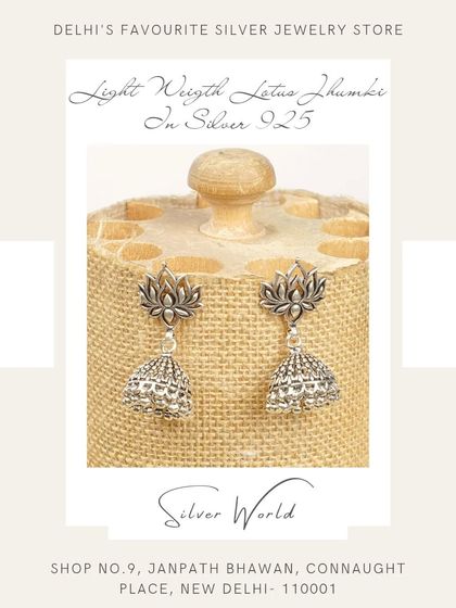 These elegant lotus jhumkis are another lightweight option for daily ethnic wear. The lotus symbolizes purity and beauty, making these earrings both stylish and meaningful.