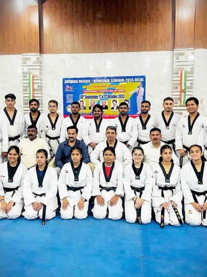 A group photo after successfully completing the National Referee seminar. It was a great experience with fellow coaches and masters.