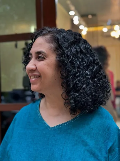 More examples of my short curly haircuts, from bobs to layered chops, each one personalized to the client's curl pattern and face shape.
