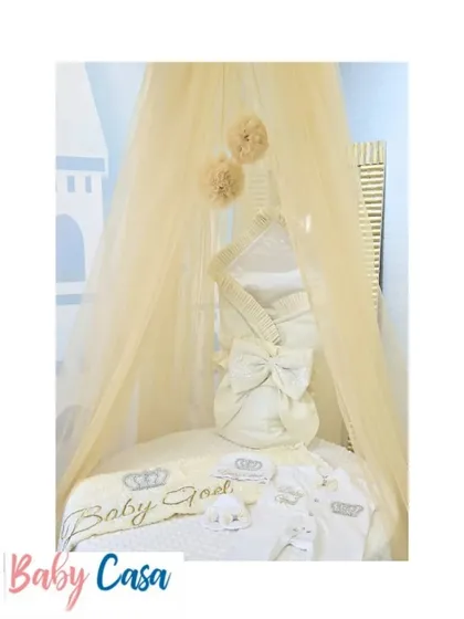 A complete nursery setup featuring one of my homecoming sets. This image shows how a personalized sleeping bag and matching accessories can be displayed beautifully in the crib, waiting for the baby.