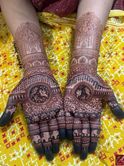 Let the stain do the talking. This is the gorgeous dark color of a design featuring lovebirds and elephants, perfect for an engagement or Roka ceremony.