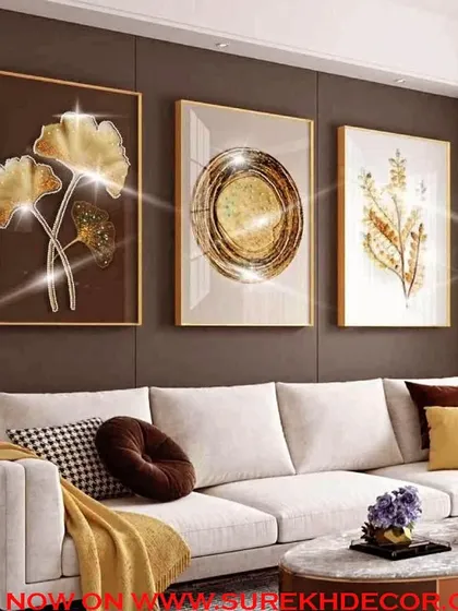 This set of three crystal paintings features abstract golden botanicals and circular motifs. The warm, earthy tones and sparkling details add a touch of glamour and sophistication to your living space.