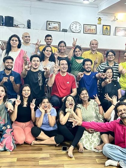 A goofy and happy group photo from our talent round and bhandara. We believe in balancing serious practice with lighthearted fun.