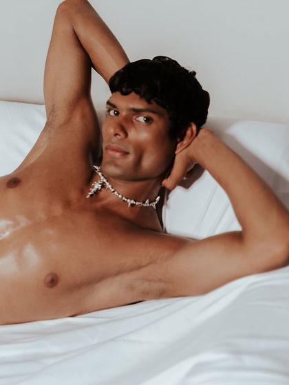 A close-up portrait from the bed series, creating a personal and intimate connection with the viewer. The focus is on the model's expression, adding a layer of personality to the campaign.