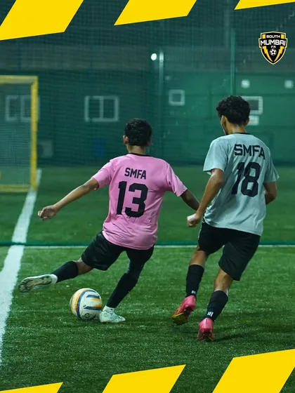 A glimpse into a competitive training match. Here, two players battle for the ball, showcasing the speed and skill that we cultivate in our academy. This is where game-changers are made.