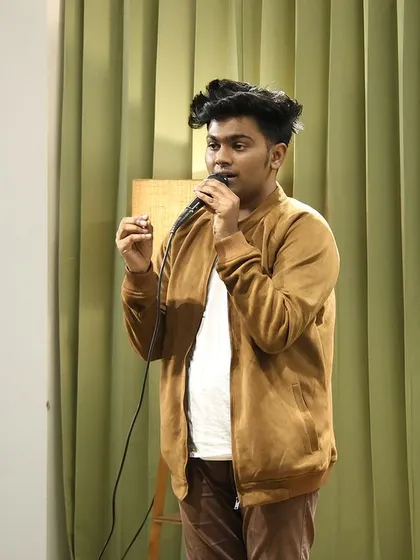 A young comedian trying out his material in our supportive space.