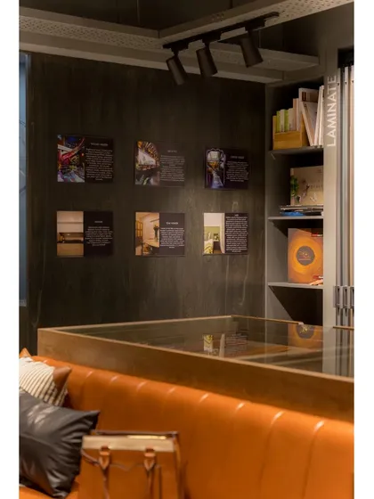 A gallery wall provides inspiration and showcases past projects, helping clients visualize the possibilities.
