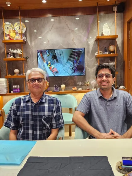 A father and son seeking guidance together. It is important for family members to understand their energetic compatibility, especially when working together in business.