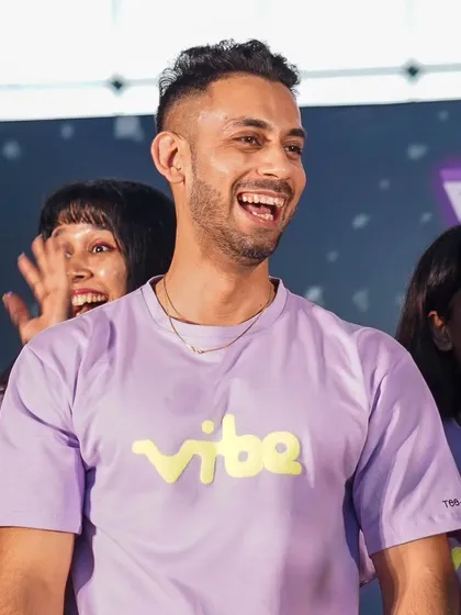 A happy, candid moment on stage with fellow instructors at the 'Vibe' event. Your smile makes life more beautiful, and my goal is to bring out as many smiles as possible in every class.