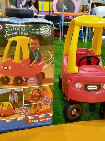 The classic Little Tikes Cozy Coupe is a favorite for a reason. This foot-powered car is perfect for indoor or outdoor play, encouraging active fun and imagination.