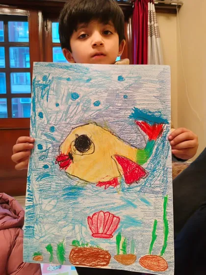A fantastic fish drawing with bold colors and a happy expression. These projects help build a strong foundation in art.