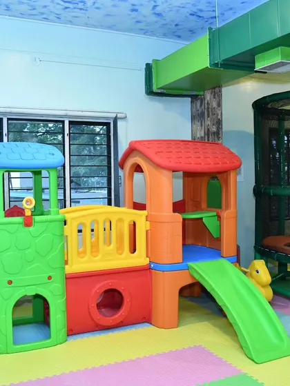 The playhouse at our Banashankari center is a hub of activity. It's a great spot for kids to engage in pretend play and socialize.
