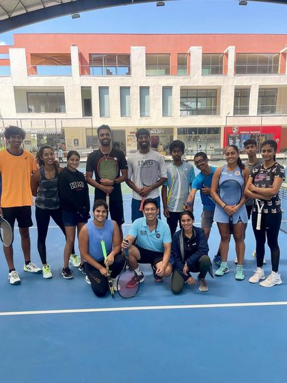 A group photo of our adult players and coaches, wrapping up a year of great tennis. We have a vibrant and welcoming community for adults.