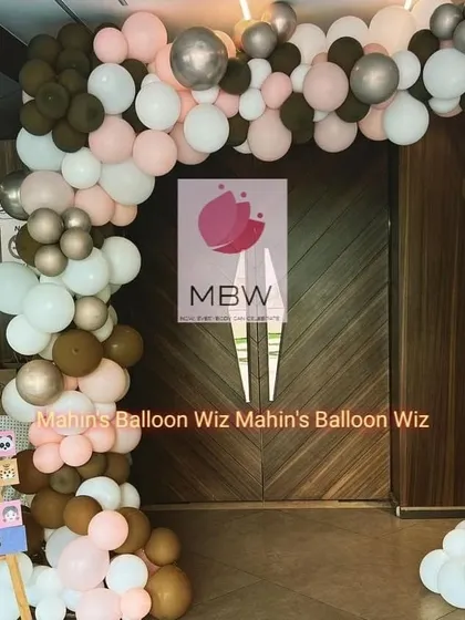 A full view of the stylish entrance arch, showing how it perfectly frames the doorway to the event.