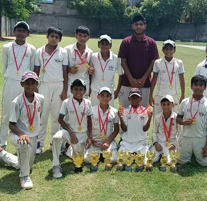 The full squad with their medals and trophies after the Monsoon Series win. Every player contributed to this success.