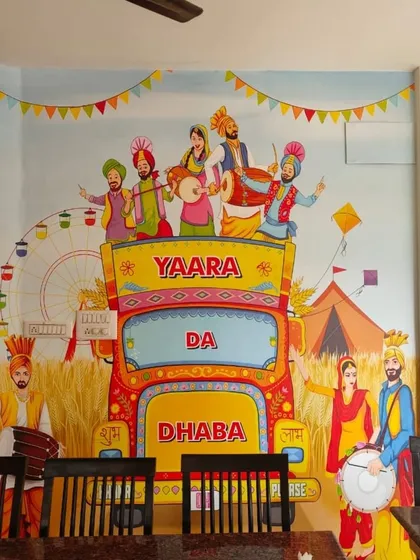 Wallpaper isn't just for homes. I designed and installed this fun, colorful mural for a "Yaara Da Dhaba" restaurant, creating a lively and welcoming atmosphere for diners. Custom murals are an effective way for businesses to establish a unique brand identity and ambiance.