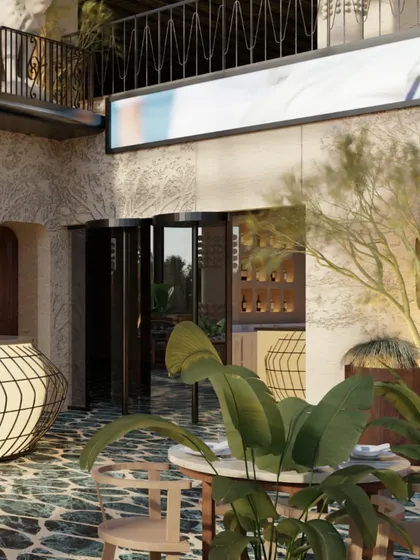 This view shows the entrance to one of the indoor zones, with a glowing, cocoon-like bar and dark, pivoting doors. The design creates a sense of mystery and anticipation.