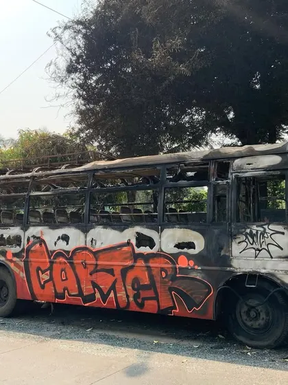 The finished piece on the abandoned bus. The raw, destroyed vehicle becomes a new canvas for my art.