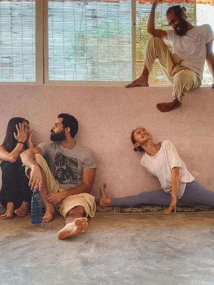 A candid moment of rest and connection between classes. The ashram is a place where you can be yourself, relax, and form genuine friendships.