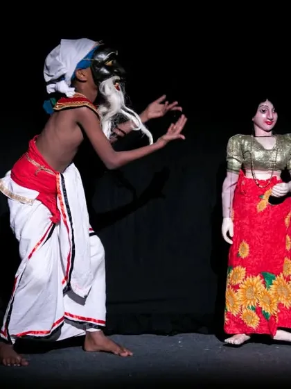 A scene depicting a story from Sri Lankan folklore, performed with life-sized marionettes. The scale and artistry of these puppets are truly breathtaking.