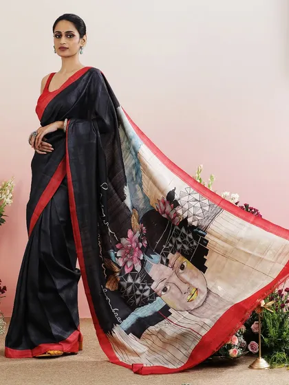 The full view of the abstract face print saree, showcasing its unique and dramatic design.
