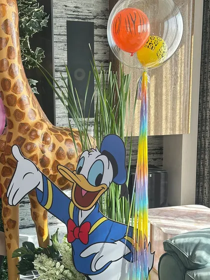 Custom cutouts of beloved characters like Donald Duck and Mickey Mouse were placed throughout the venue, creating perfect photo opportunities for the little guests.