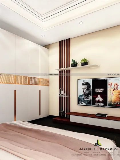 This design focuses on maximizing storage and functionality. It features a clean white wardrobe with copper-toned accents and a sleek, integrated TV and entertainment unit.