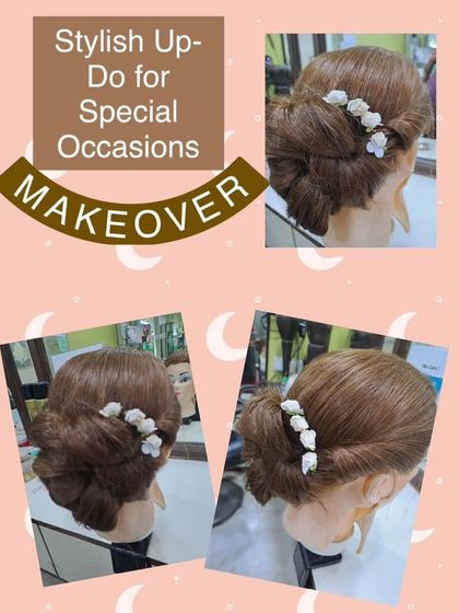 A stylish updo featuring a low bun decorated with delicate white floral accessories. This romantic style is perfect for a bride or bridesmaid.