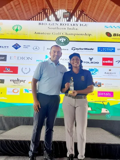 Aahana Kashyap receiving her trophy. This was her first podium finish on the main tour and a result of her incredible work ethic.