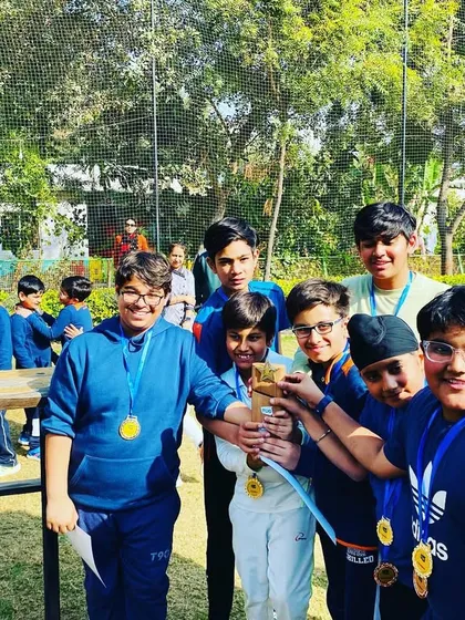 The Mafia 7 team, champions of the Junior BCL, celebrating their victory together. Teamwork makes the dream work.