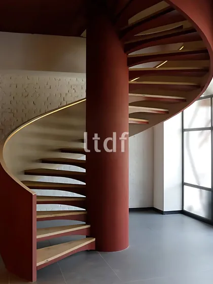 This sculptural spiral staircase is more than a functional element; it is the artistic heart of the space. Its bold color and floating form create a powerful visual statement, demonstrating our belief that even the smallest details can define a home's character.