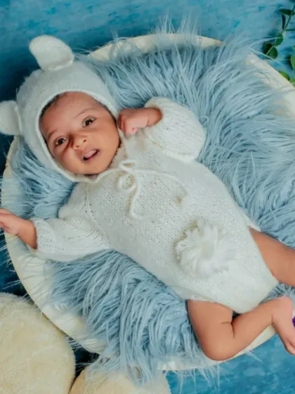 The cutest little bear in the forest. I use soft textures and sweet outfits, like this knitted bear romper, to create cozy and adorable portraits.