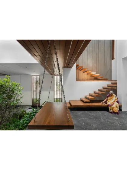 The Janani House also received a commendation at the IIID Design Excellence Awards. This image captures the essence of the home with its indoor swing and multi-level staircase.