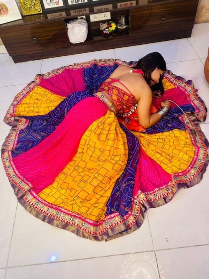 Another artistic overhead shot of the multi-color patchwork Garba lehenga.