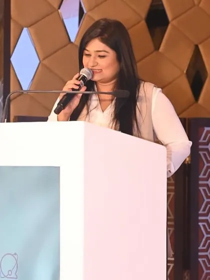 A candid moment of interaction while hosting the 'Quoraverse' summit. Connecting with the audience is what I do best.