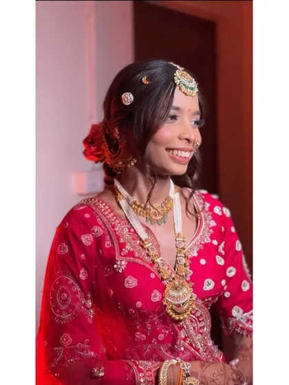 A candid moment of pure happiness. This photo shows how my makeup enhances a bride's natural joy, with a focus on skin that looks like skin.