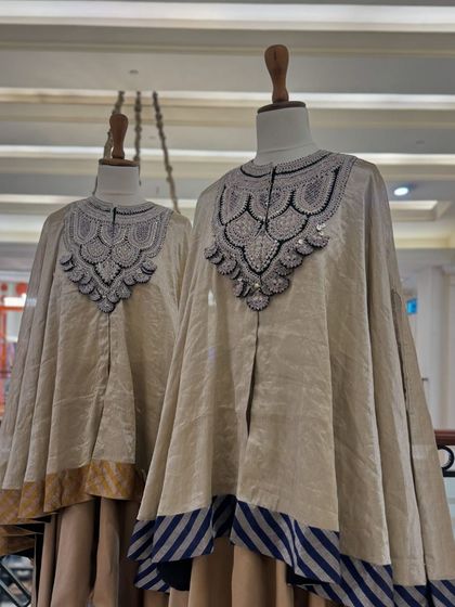 Another angle of the elegant Prisho sets, showing the beautiful contrast of the striped and solid borders.