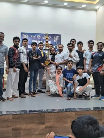 The team celebrating our student's Grand Championship win. Success is a collective effort, and we always support each other.