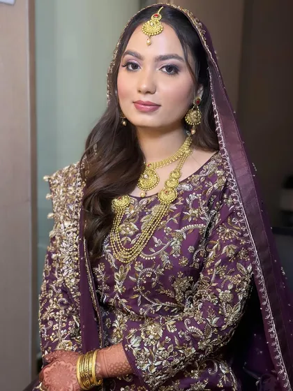 Amena's complete Walima look. The makeup is polished and sophisticated, perfect for this formal event.