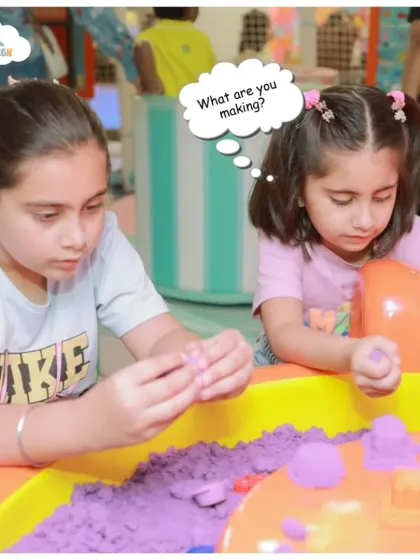"What are you making?" Kids get creative and focused while playing with kinetic sand in one of our imagination corners.