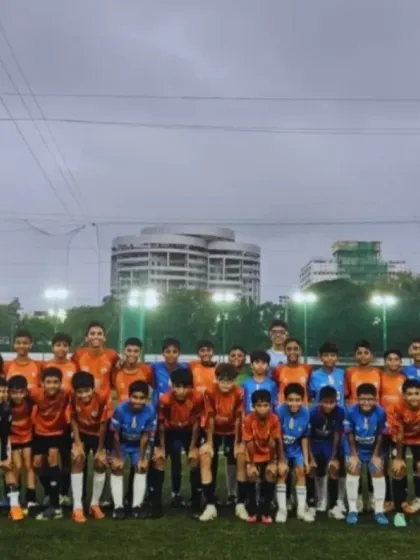 Two teams line up before a 9-a-side practice match. These games are crucial for our players' development and for building camaraderie before heading to major tournaments.