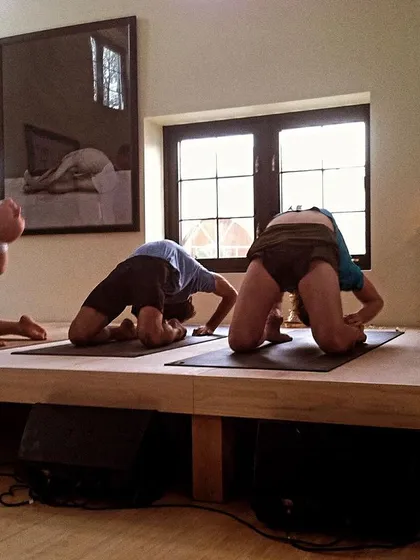My Guruji observing practitioners in Ustrasana (Camel Pose) during the opening of the Greenwich shala. His presence and guidance have been a profound transformational force in my life.