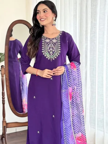 A beautiful violet chanderi viscose kurta set. The thread embroidery and printed dupatta create a look that's both regal and feminine.