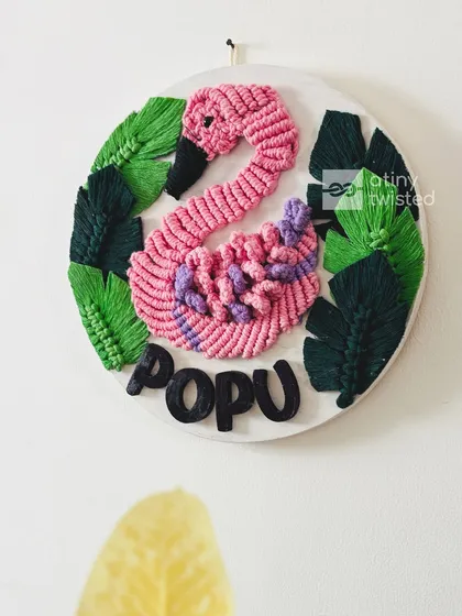 Another view of the personalized swan nameplate, showing how the macramé leaves frame the piece. This was created as a one-of-a-kind birthday gift.