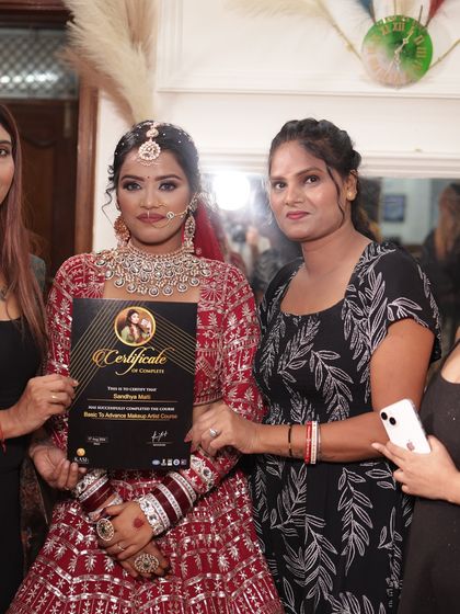 Presenting a certificate to a student who worked so hard to perfect her skills.